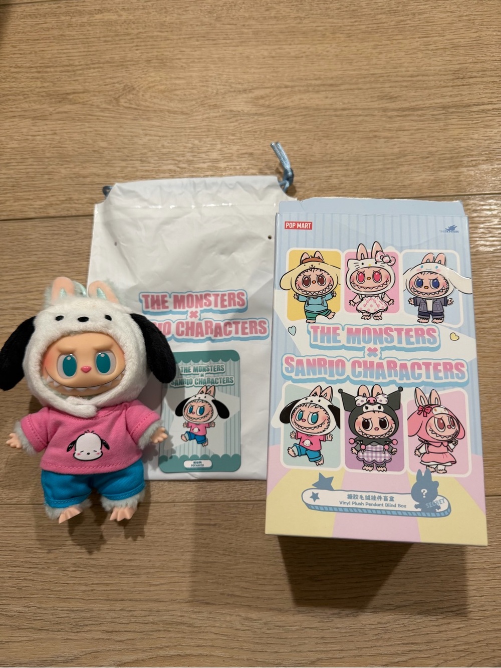 The Monsters x Sanrio Characters pochacco Labubu